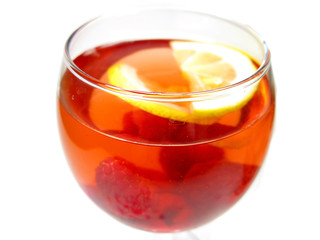 fruit red punch cocktail drink with raspberry