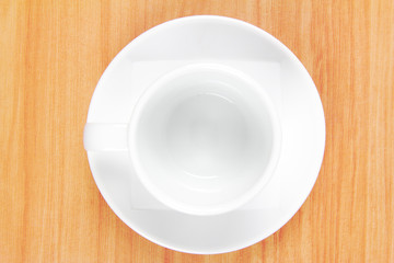 Empty of coffee cup on wood
