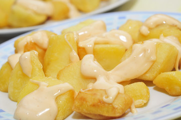 typical spanish patatas bravas, spicy potatoes