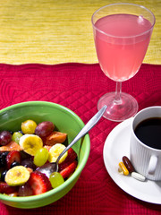 Fruit , Juice, Vitamins and a Cup of Coffee
