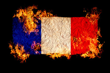 French flag in fire.