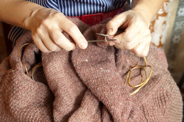 woman's hands  knitting