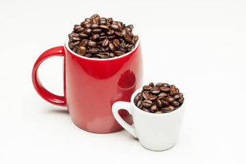 Red and white cups with coffee beans