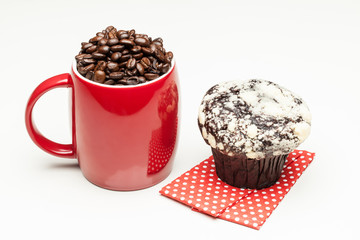 Red coffee cup with muffin