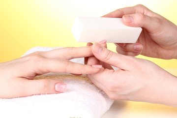 Manicure process in salon