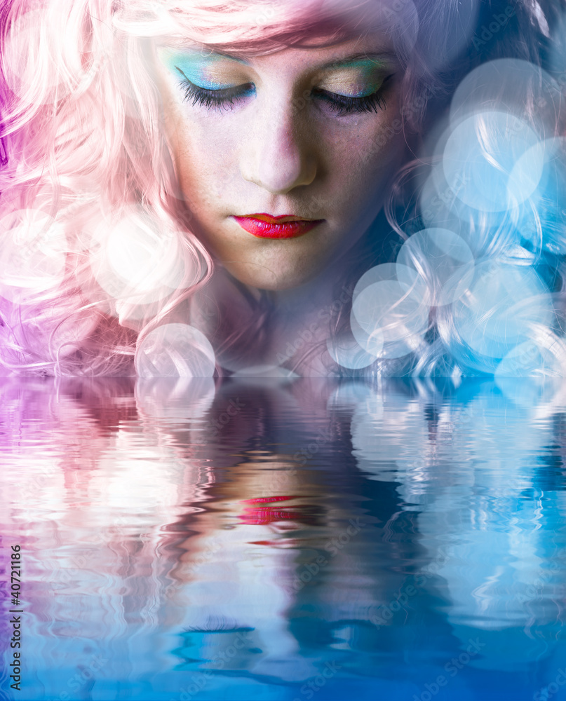 Wall mural sweet teen with colored hair, light effects in the water reflect