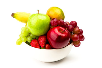 Fresh fruit on plate  Isolated on white