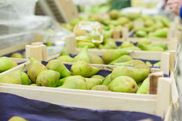 Pears in boxes in supermarket