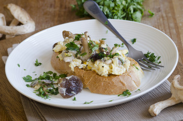 Toast with mushrooms and scrambled eggs