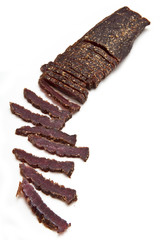 South African biltong (beef) isolated on a white background