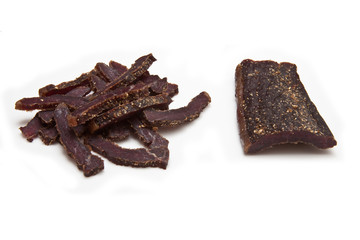 South African biltong (beef) isolated on a white background