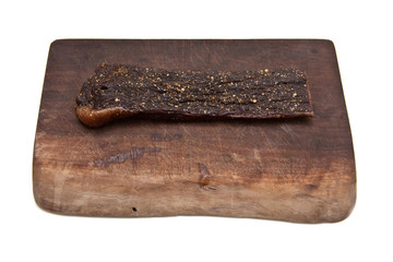 South African biltong (beef) isolated on a white background