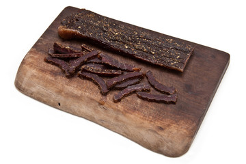 South African biltong (beef) isolated on a white background