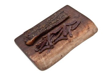South African biltong (beef) isolated on a white background