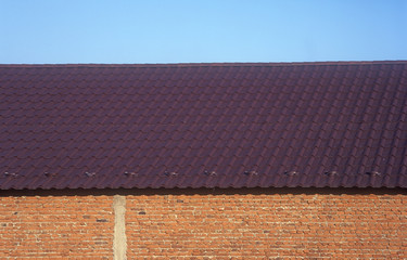 Wall, roof and sky.