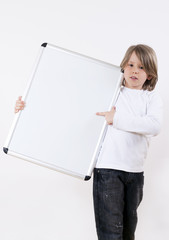 Boy holding white drawing board
