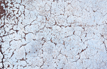 A lot of cracks on a blue background