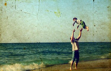 Happy father and son on the beach - 40740115