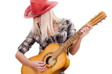 The beautiful girl in a cowboy's hat isolated