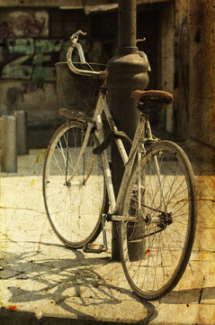 old bicycle. Photo in old image style.