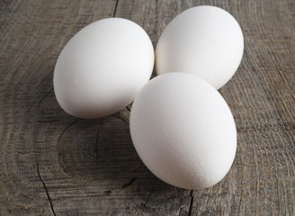 Eggs on wooden background