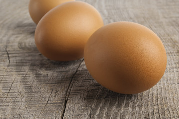 Eggs on wooden background