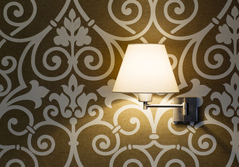 Lamp on a wall shining