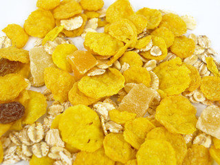 Pile of granola cereal on white