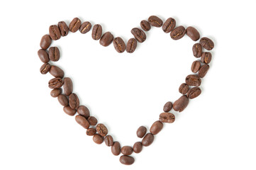 Big heart shape made of coffee beans, white background