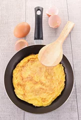 Foto op Plexiglas omelette in pan © M.studio
