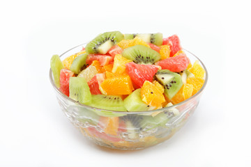 Fresh fruits salad on white background