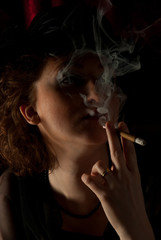 Smoking woman in night