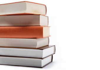 A stack of books on a white background.
