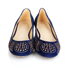 Elegant blue flat shoes for women in stones isolated on white