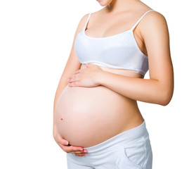 pregnant woman holding  piggy bank