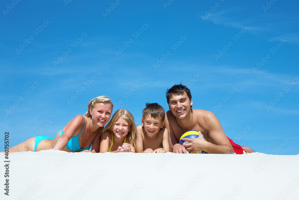 Wall mural family on sand