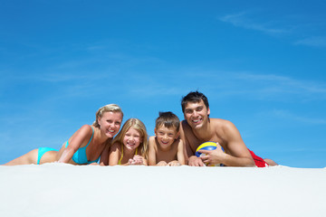 Family on sand