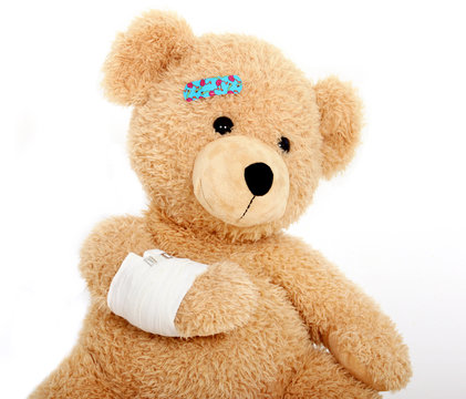 Teddyb&auml;r mit einem Armverband