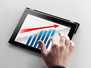 Man works on his tablet pc