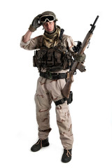 Soldier with rifle against white background. Full body.