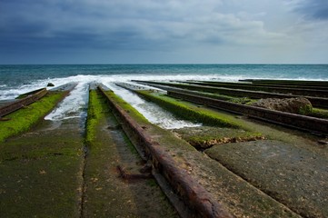 Old rails for descending boat into water.