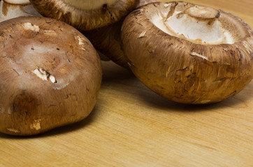 Portobello mushrooms on a cutting board