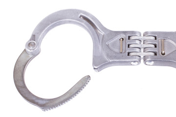 A close-up of metal handcuffs
