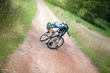 Mountain biker stopped having problem with chain of his bicycle