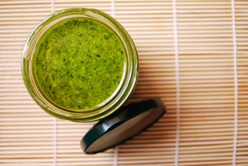 Fresh basil pesto, italian green sauce dressing for pasta