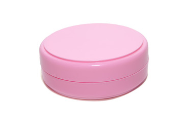 Pink cream plastic bottle