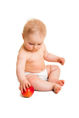 Cute infant girl with apple isolated on white