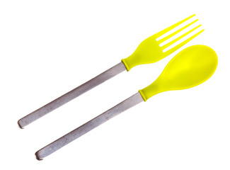 Children green fork and spoon isolated on a white background