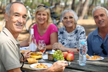 Foto op Plexiglas family eating picnic in the forest © auremar