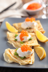 Crepes with caviar